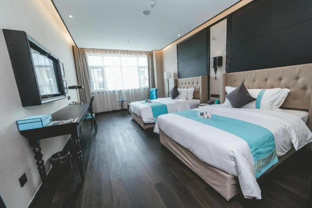 Bed in Xana Hotelle Binzhou Yangxin