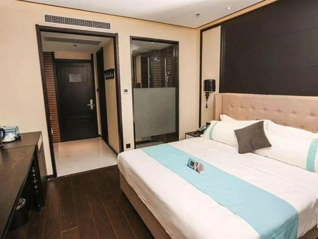 Bed in Xana Hotelle Binzhou Yangxin