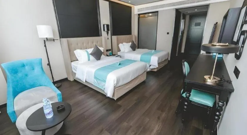 Bed in Xana Hotelle Binzhou Yangxin