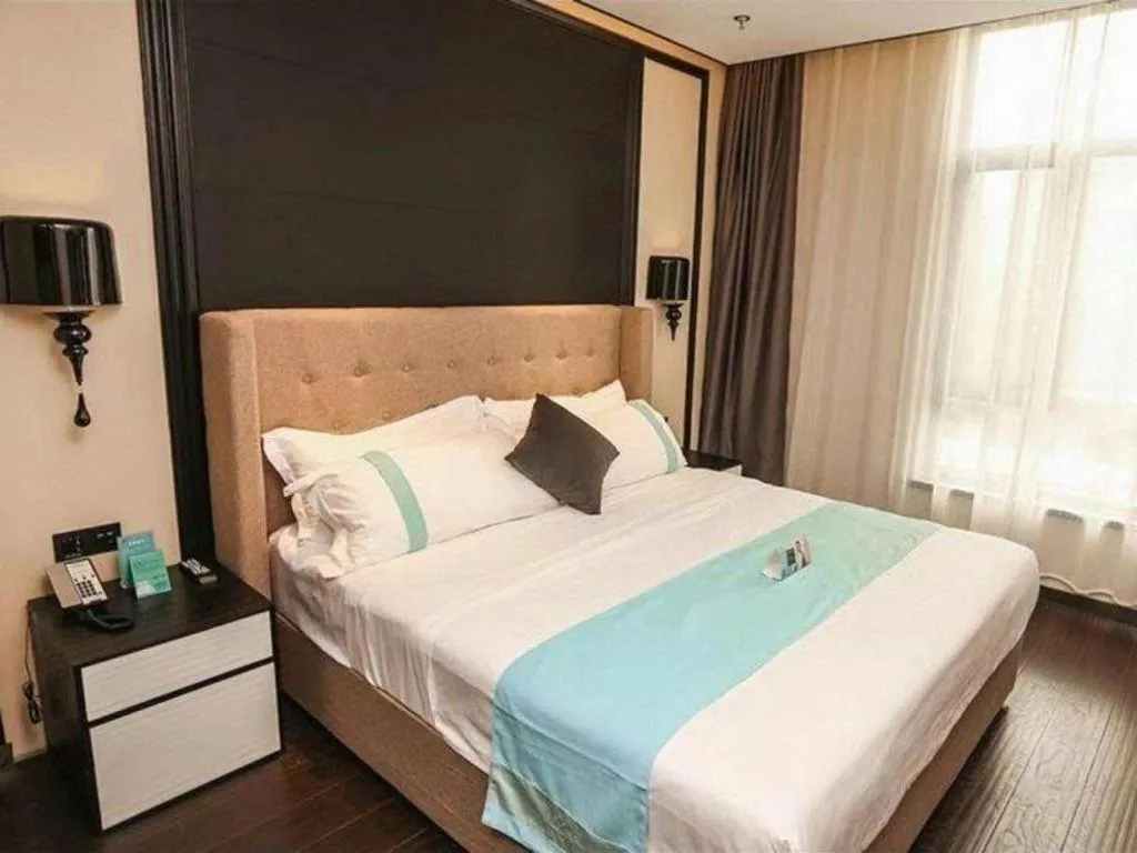 Bed in Xana Hotelle Binzhou Yangxin