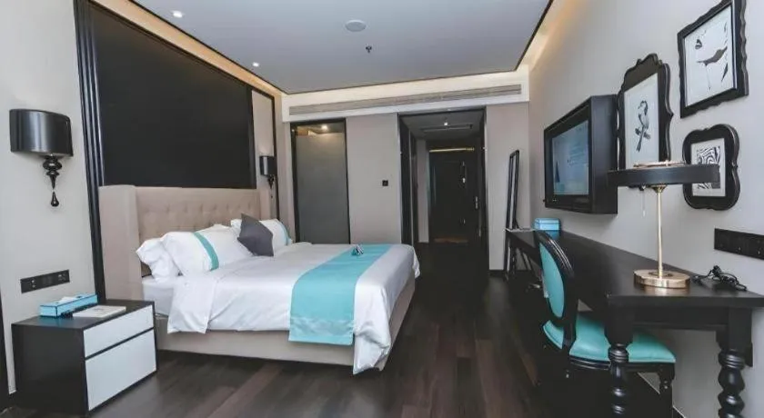 Bed in Xana Hotelle Binzhou Yangxin