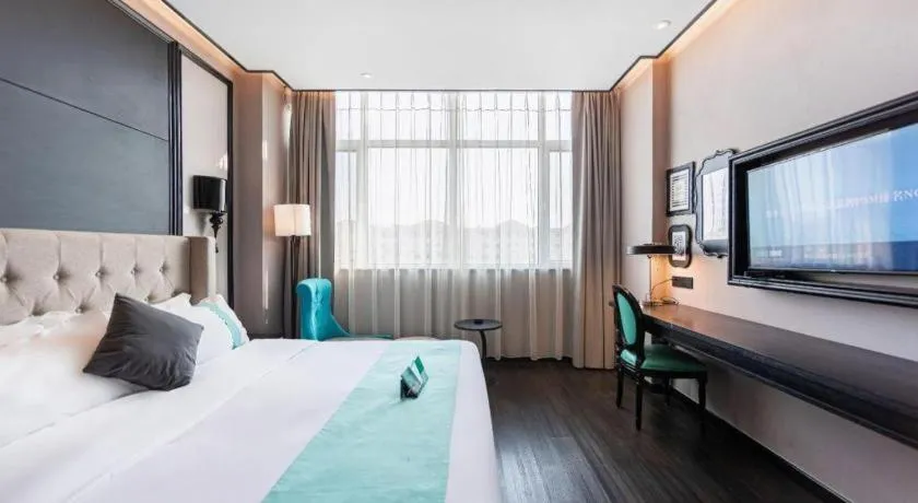 Bed in Xana Hotelle Binzhou Yangxin