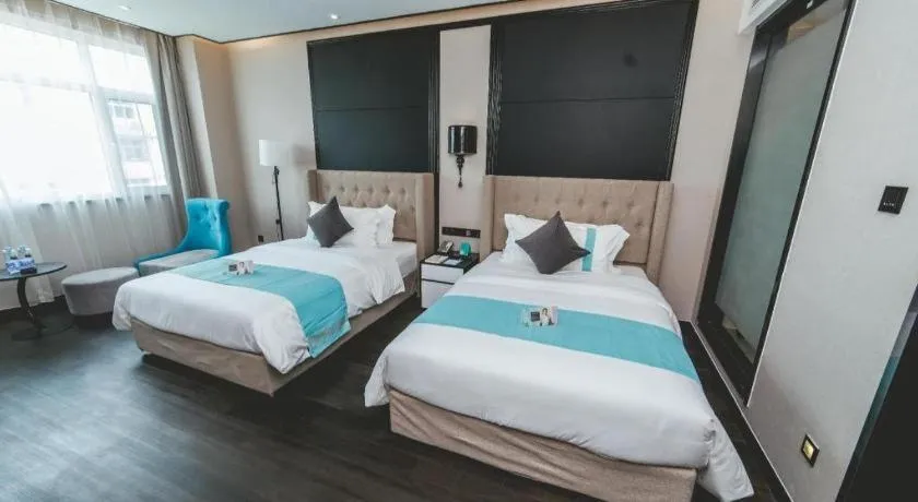 Bed in Xana Hotelle Binzhou Yangxin