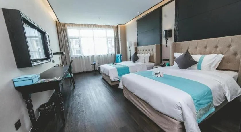 Bed in Xana Hotelle Binzhou Yangxin