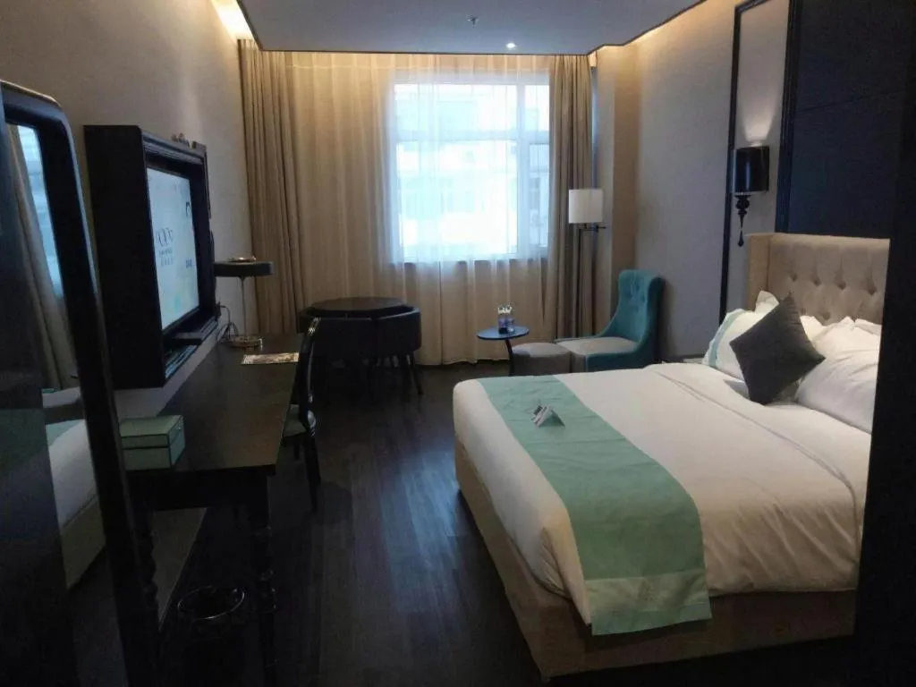 Bed in Xana Hotelle Binzhou Yangxin