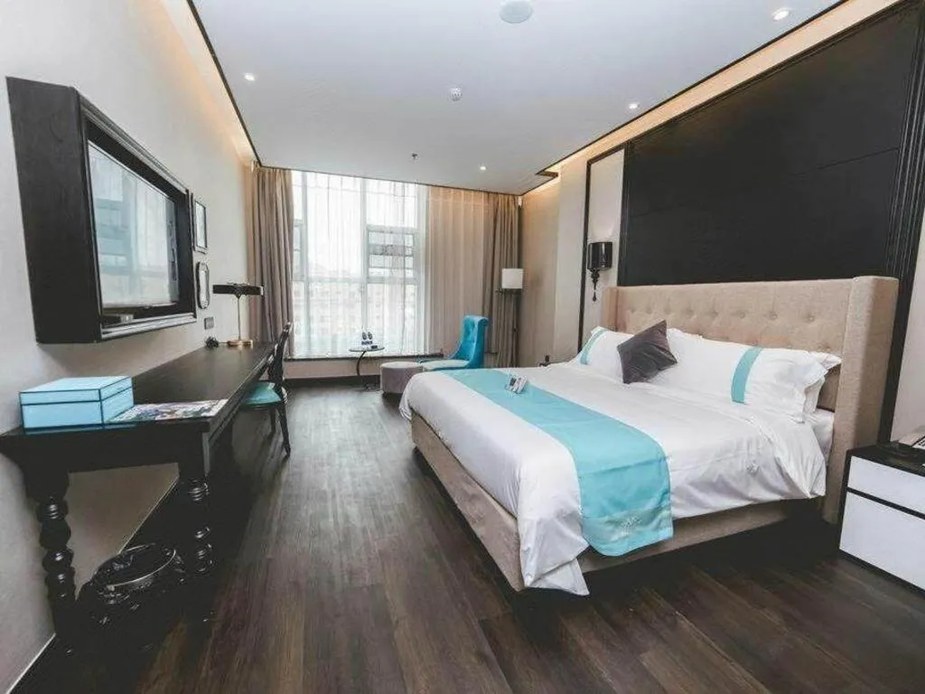 Bed in Xana Hotelle Binzhou Yangxin