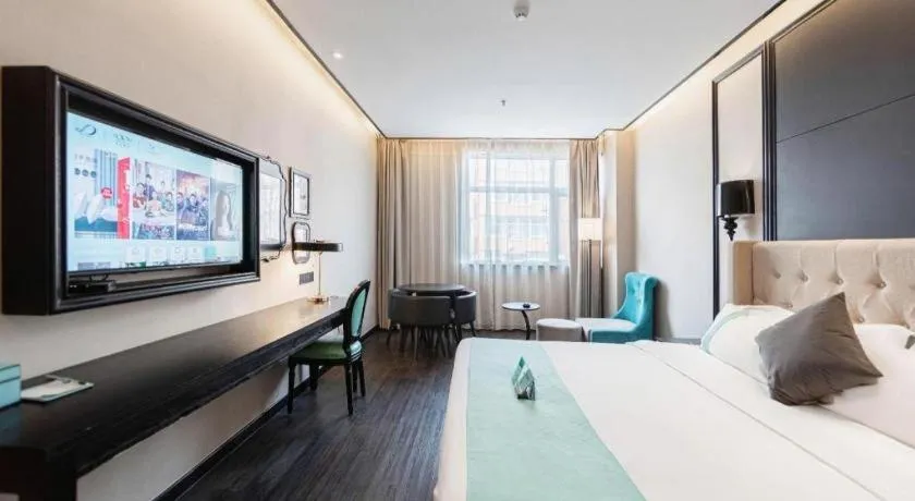 Bed in Xana Hotelle Binzhou Yangxin