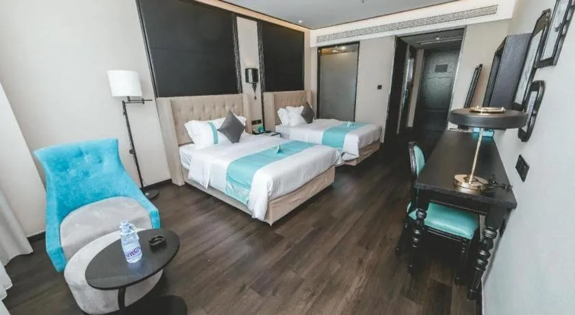 Bed in Xana Hotelle Binzhou Yangxin