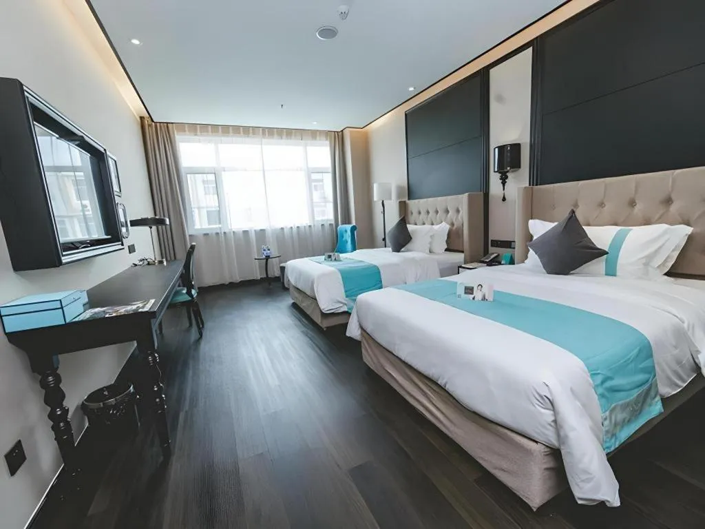 Bed in Xana Hotelle Binzhou Yangxin