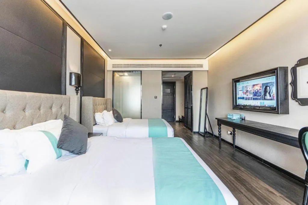 Bed in Xana Hotelle Binzhou Yangxin