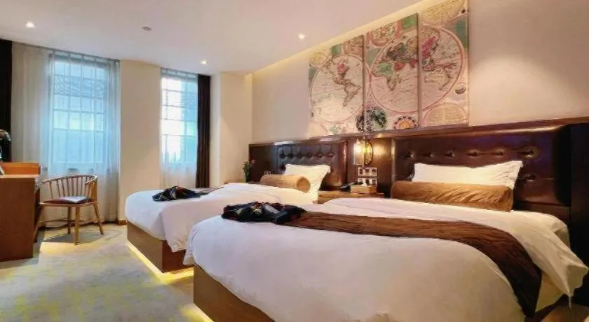 Bed in James Joyce Coffetel Taizhou Jiangyan Bus Terminal