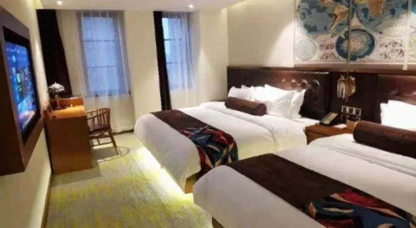 Bed in James Joyce Coffetel Taizhou Jiangyan Bus Terminal