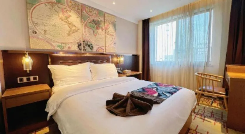 Bed in James Joyce Coffetel Taizhou Jiangyan Bus Terminal