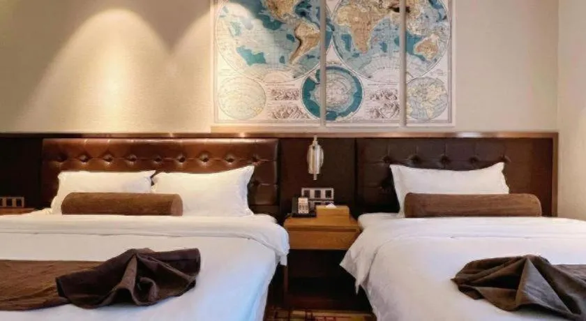 Bed in James Joyce Coffetel Taizhou Jiangyan Bus Terminal