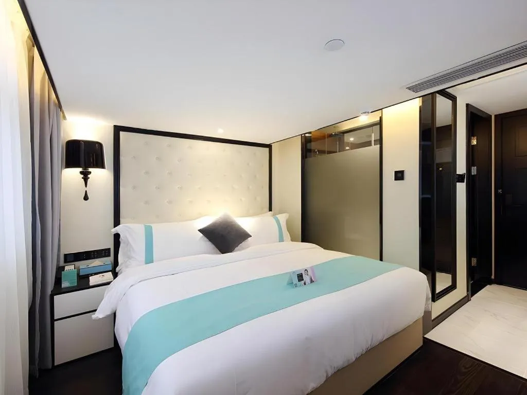 Bed in Xana Hotelle Shenzheng South Station Foxconn