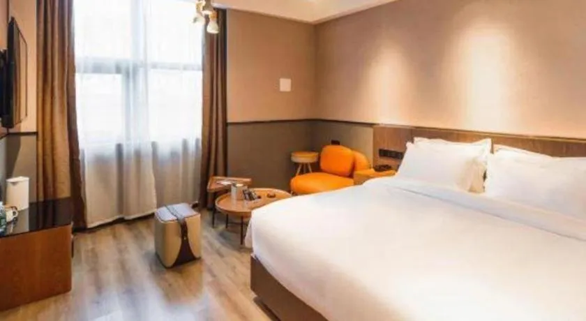 Bed in ZMAX Hotel Yan'an Baimi Avenue Baotashan