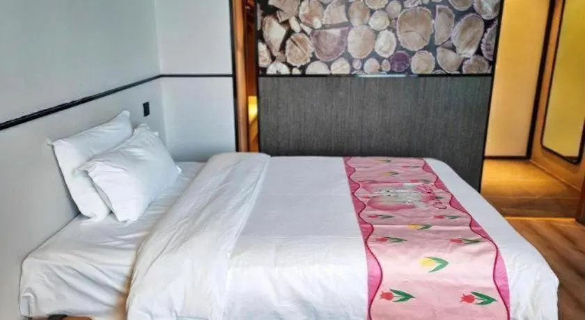 Bed in ZMAX Hotel Yan'an Baimi Avenue Baotashan