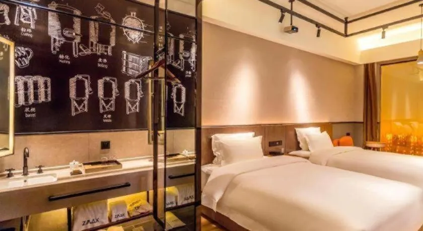 Bed in ZMAX Hotel Yan'an Baimi Avenue Baotashan