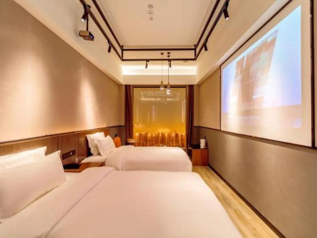 Bed in ZMAX Hotel Yan'an Baimi Avenue Baotashan