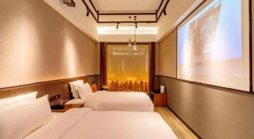 Bed in ZMAX Hotel Yan'an Baimi Avenue Baotashan