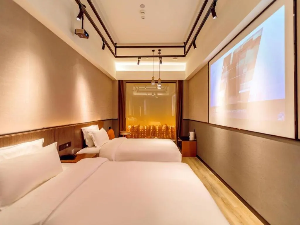 Bed in ZMAX Hotel Yan'an Baimi Avenue Baotashan