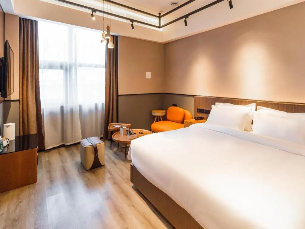 Bed in ZMAX Hotel Yan'an Baimi Avenue Baotashan