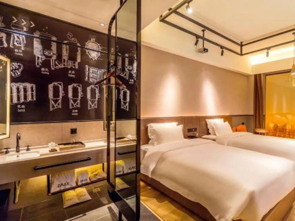 Bed in ZMAX Hotel Yan'an Baimi Avenue Baotashan