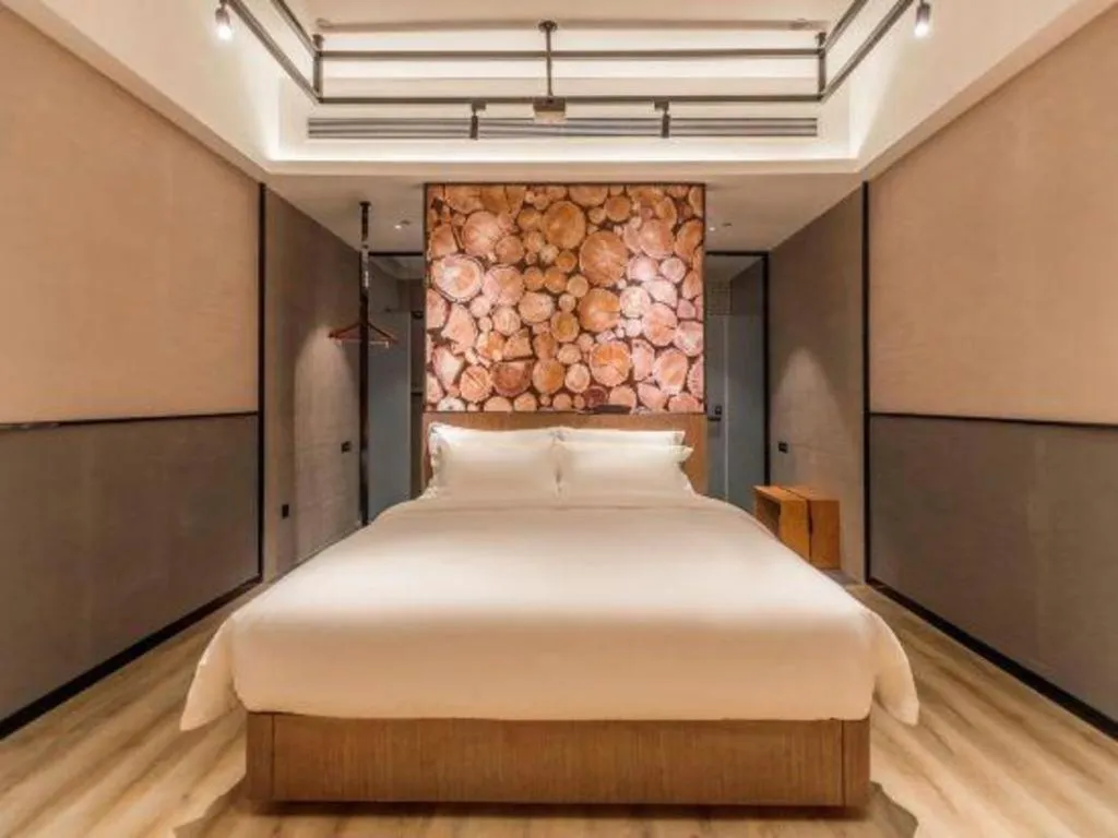 Bed in ZMAX Hotel Yan'an Baimi Avenue Baotashan