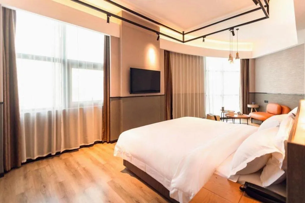 Bed in ZMAX Hotel Yan'an Baimi Avenue Baotashan