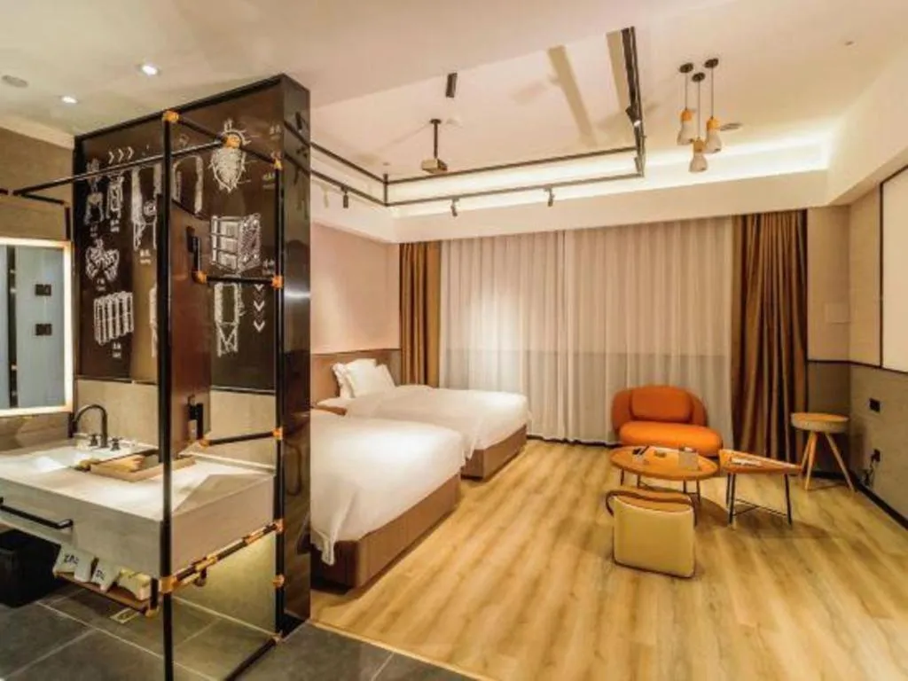 Bed in ZMAX Hotel Yan'an Baimi Avenue Baotashan