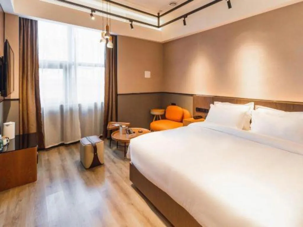 Bed in ZMAX Hotel Yan'an Baimi Avenue Baotashan