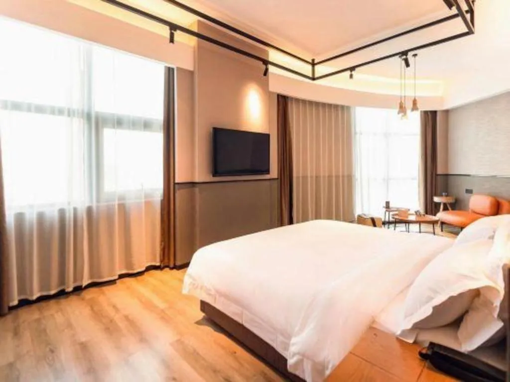 Bed in ZMAX Hotel Yan'an Baimi Avenue Baotashan