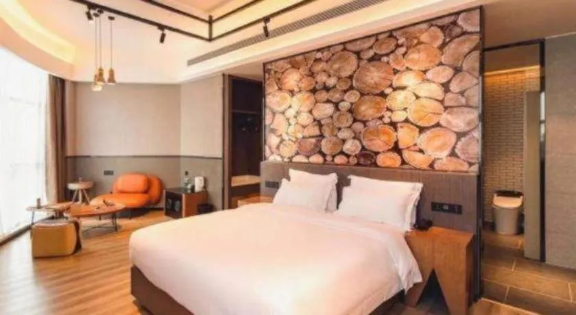 Bed in ZMAX Hotel Yan'an Baimi Avenue Baotashan