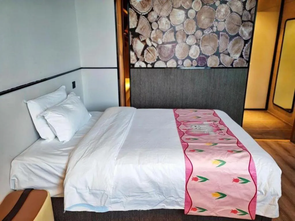 Bed in ZMAX Hotel Yan'an Baimi Avenue Baotashan