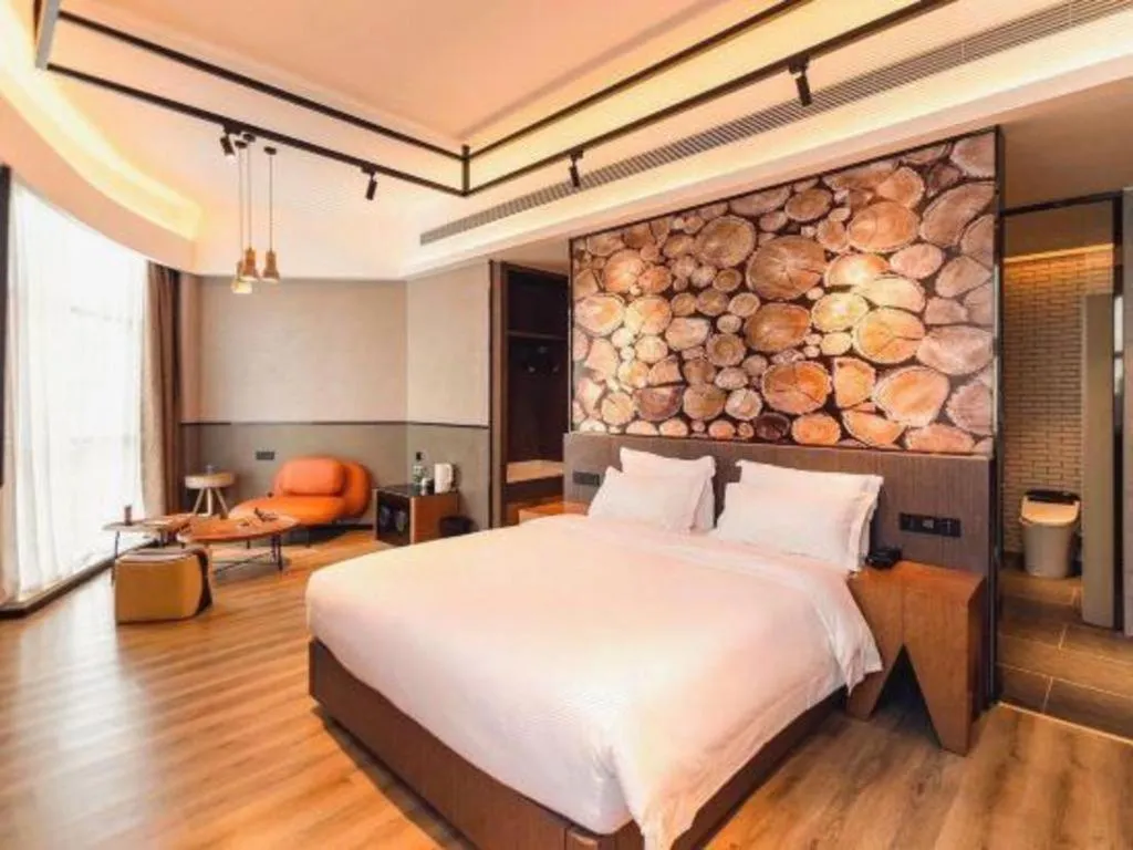 Bed in ZMAX Hotel Yan'an Baimi Avenue Baotashan