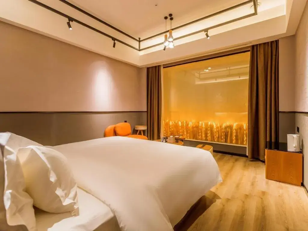 Bed in ZMAX Hotel Yan'an Baimi Avenue Baotashan Bed in ZMAX Hotel Yan'an Baimi Avenue Baotashan