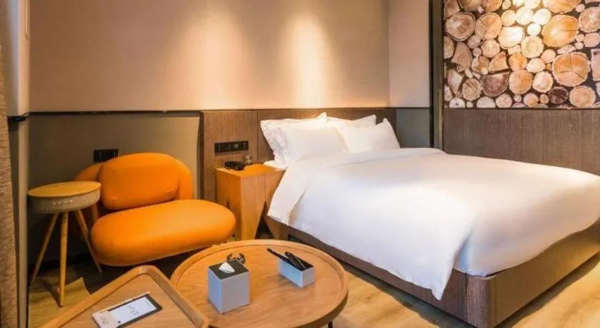 Bed in ZMAX Hotel Yan'an Baimi Avenue Baotashan