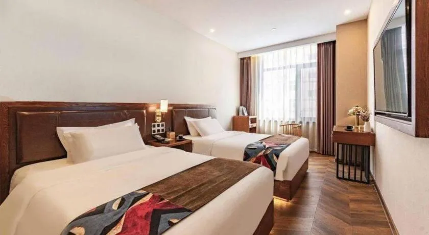 Bed in James Joyce Coffetel Tianjing First Central Hospital Nankai University