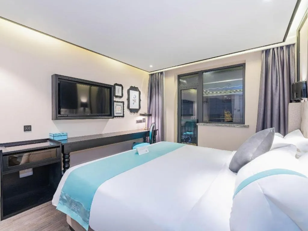 Bed in Xana Hotelle Xi'an Zhonglou Luoma