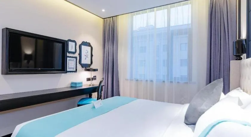 Bed in Xana Hotelle Xi'an Zhonglou Luoma