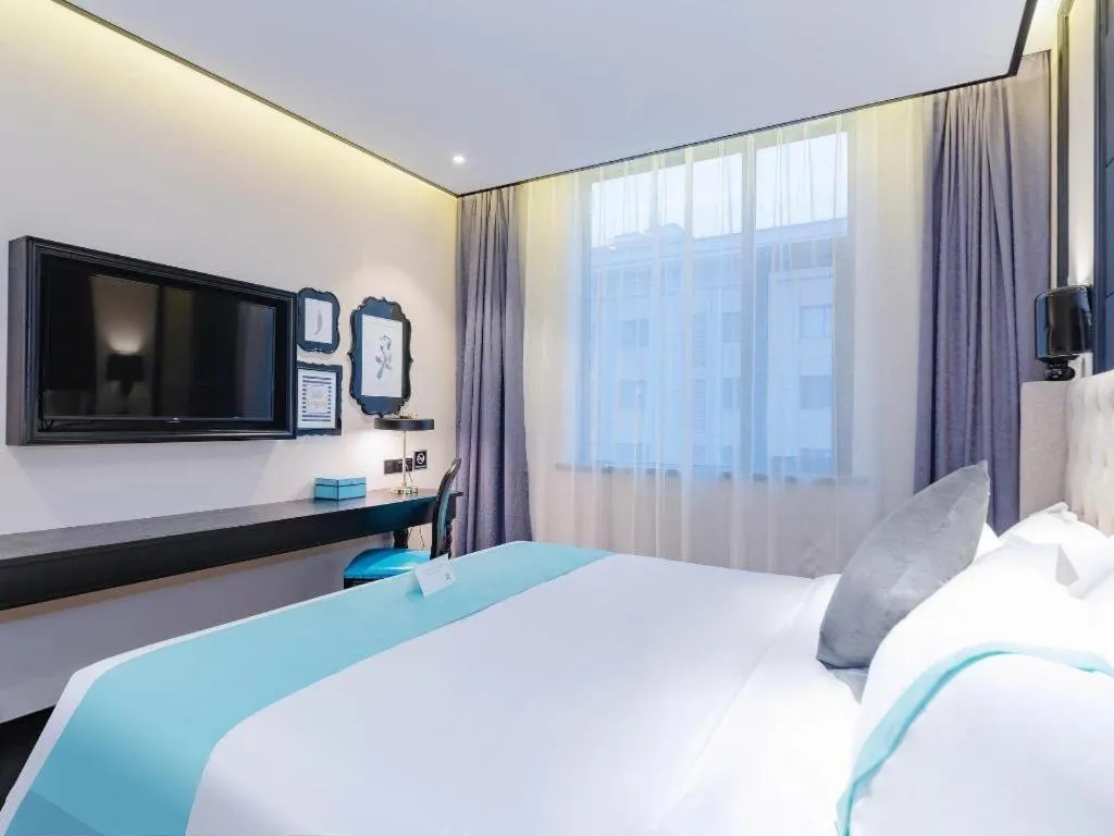 Bed in Xana Hotelle Xi'an Zhonglou Luoma