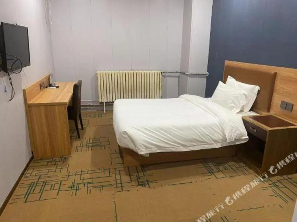 Bed in James Joyce Coffetel Beijing Yizhuang Development Zone Chicheng Times Square