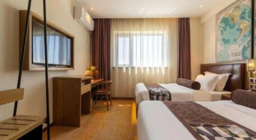 Bed in James Joyce Coffetel Beijing Yizhuang Development Zone Chicheng Times Square