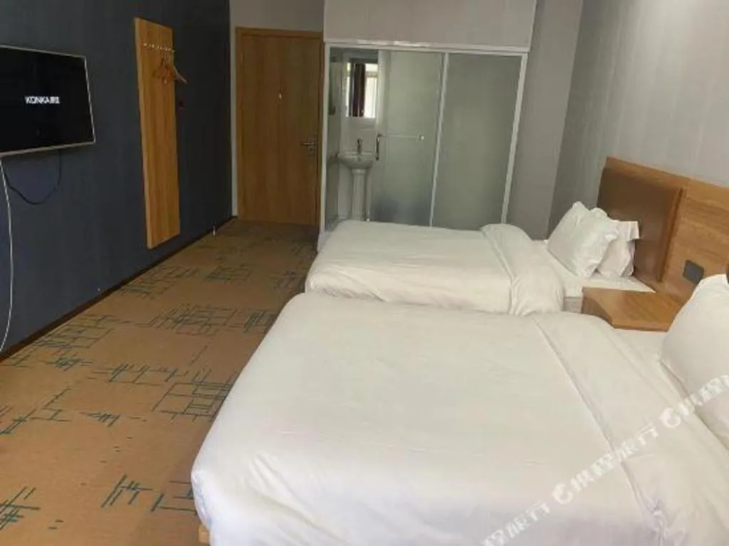 Bed in James Joyce Coffetel Beijing Yizhuang Development Zone Chicheng Times Square