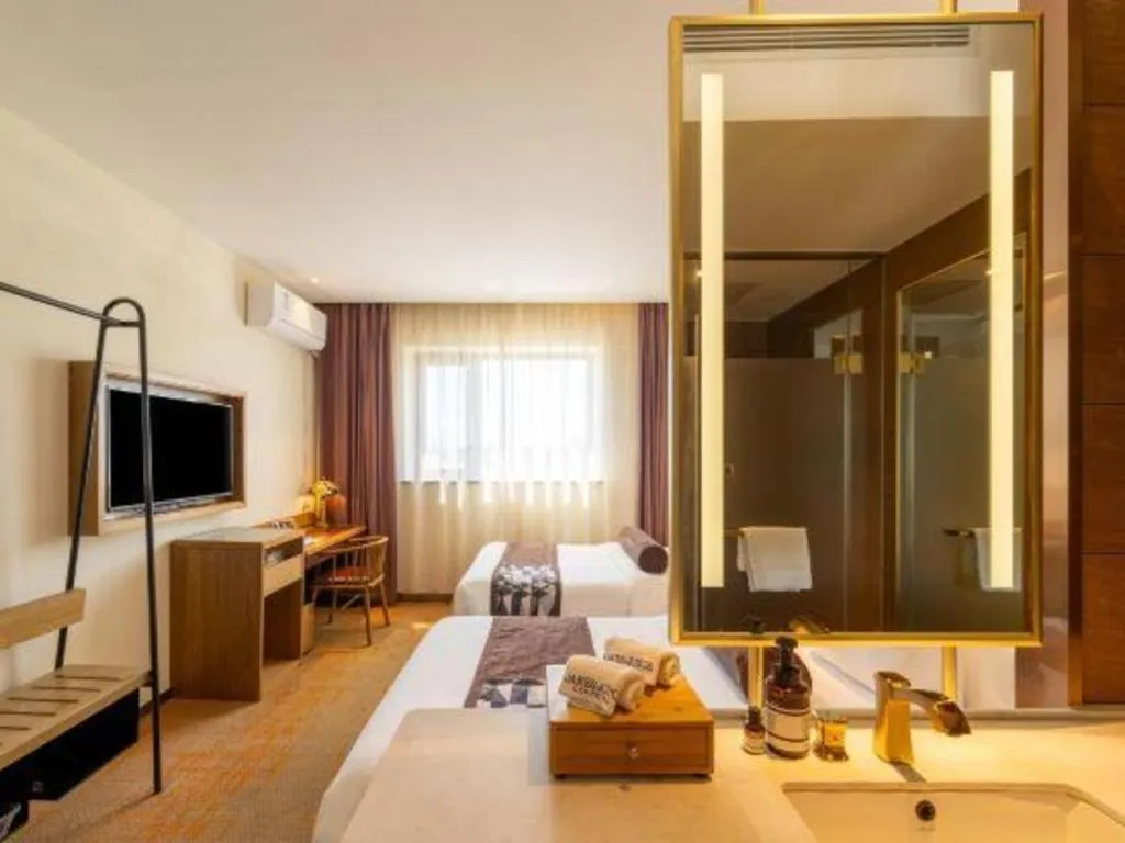 Bed in James Joyce Coffetel Beijing Yizhuang Development Zone Chicheng Times Square