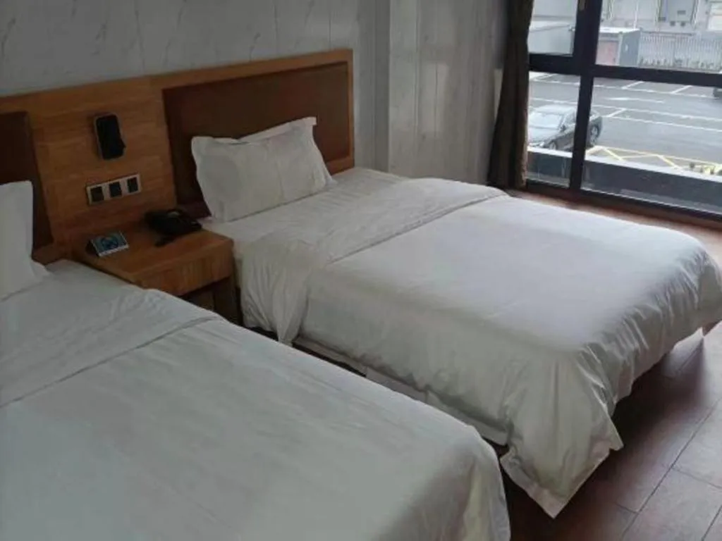 Bed in James Joyce Coffetel Beijing Yizhuang Development Zone Chicheng Times Square