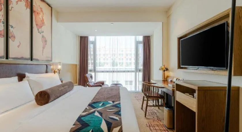 Bed in James Joyce Coffetel Beijing Yizhuang Development Zone Chicheng Times Square