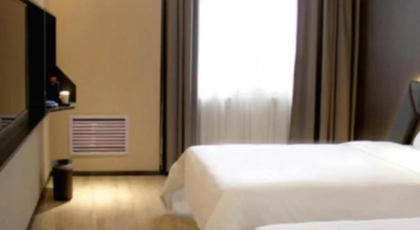 Bed in IU Hotel Lanzhou New District Airport Ruiling International