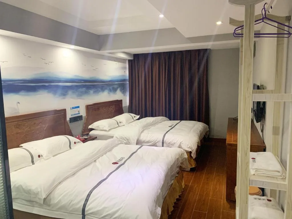 Bed in Pai Hotel Huai'an Lianshui Huaipu Bei Road