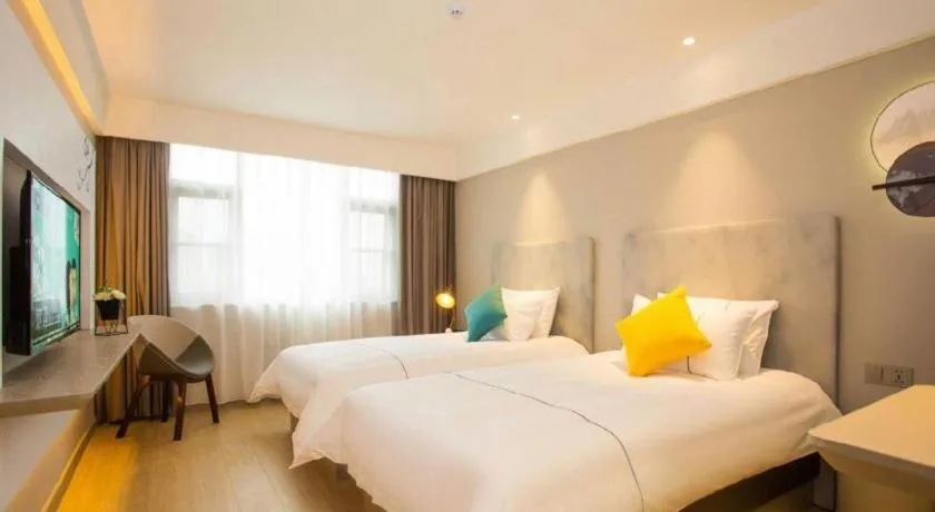 Bed in Magnotel Hotel Suzhou Wanda Plaza Huaihai Road